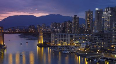 Yaletown and the Burrard Bridge in False Creek in the city of Vancouver, British Columbia in Canada.